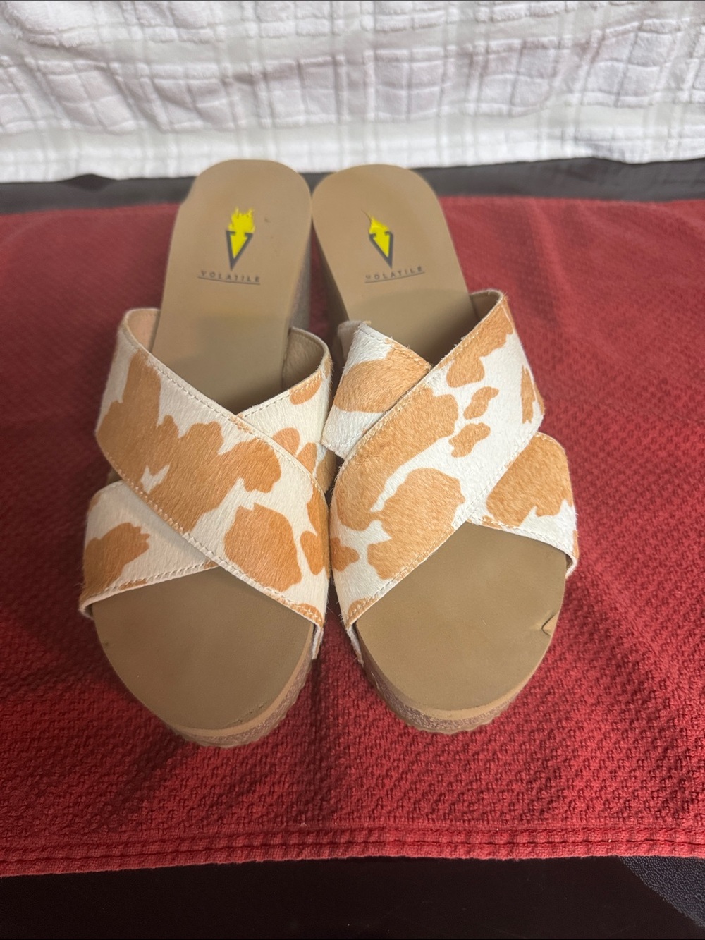 Volatile Tan and White Cowhide Crisscross Wedge Slides